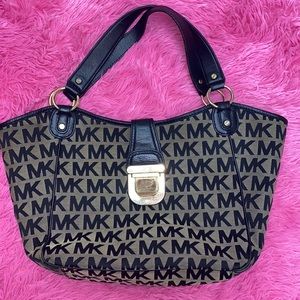 Michael Kors medium size black and brown handbag